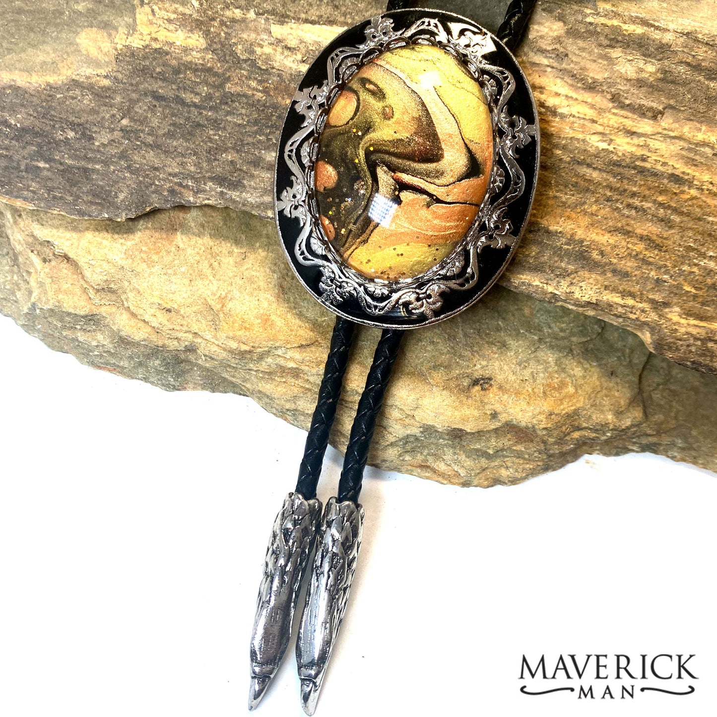 Handsome bolo tie and buckle set with hand painted stones