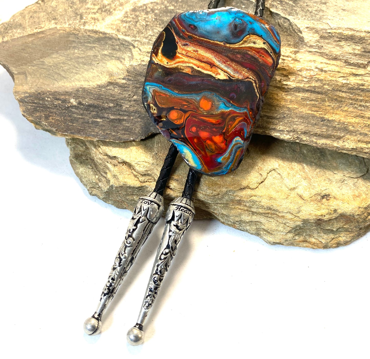 Large slate bolo tie with southwestern colors