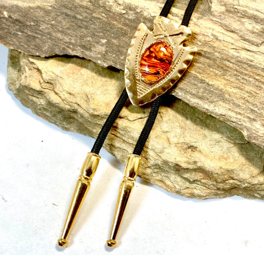 Lightweight golden arrowhead bolo with earthtone hand painted stone