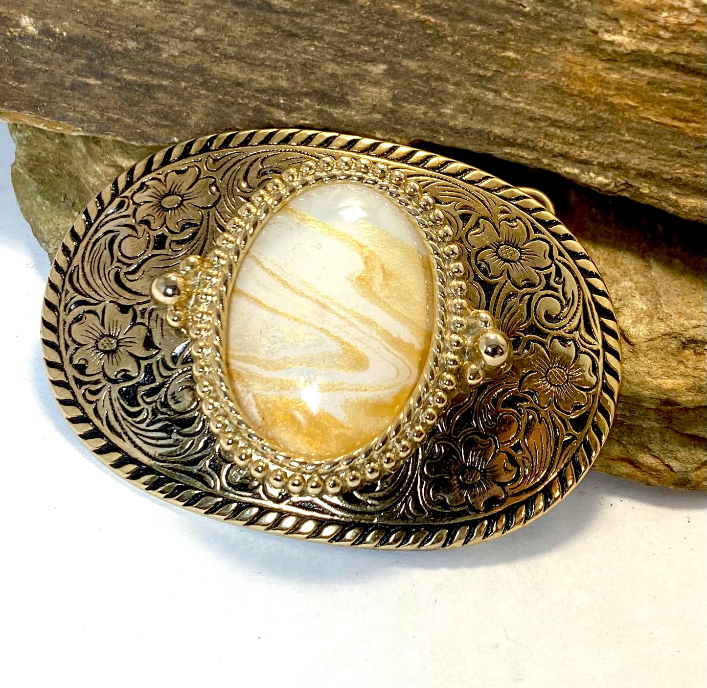 Eye-catching gold and white bolo and buckle set