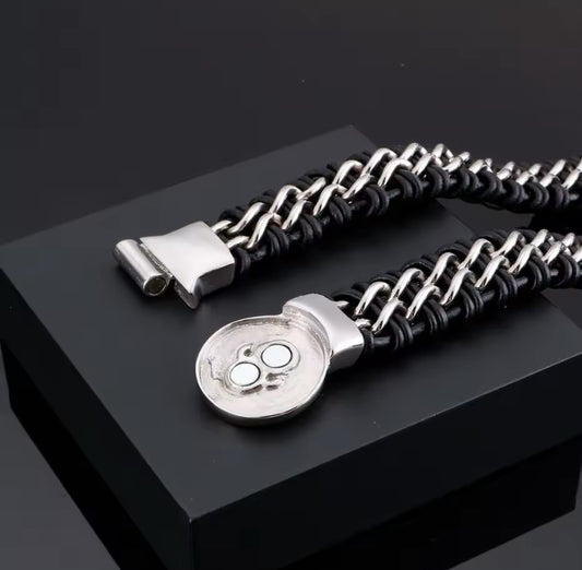 Heavy duty black and gold leather bracelet with stainless steel wolf