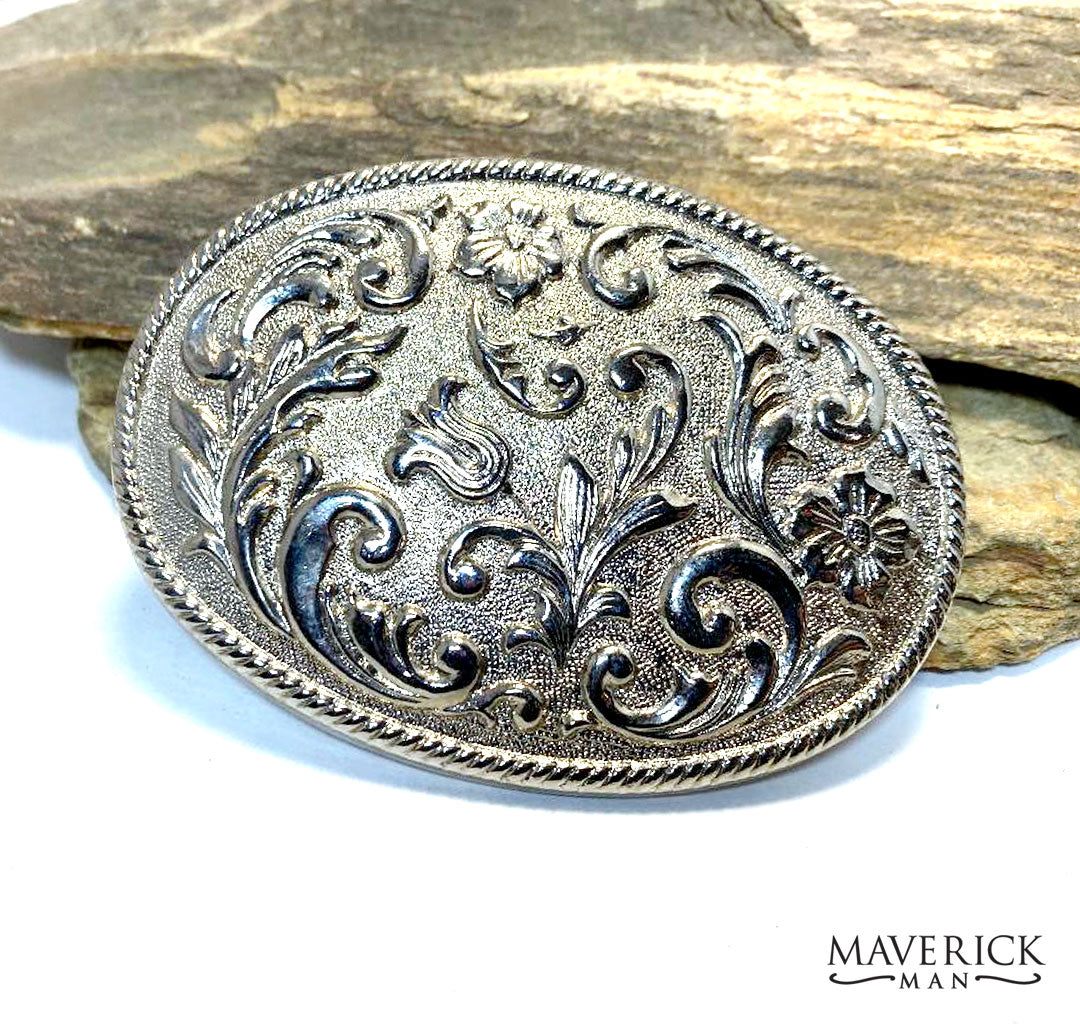 Silver toned tooling design belt buckle