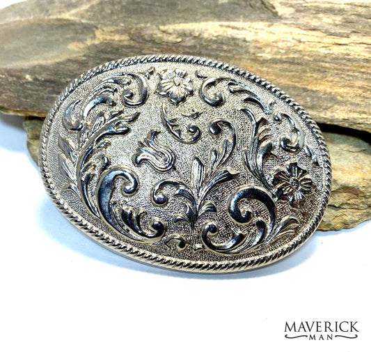 Silver toned tooling design belt buckle