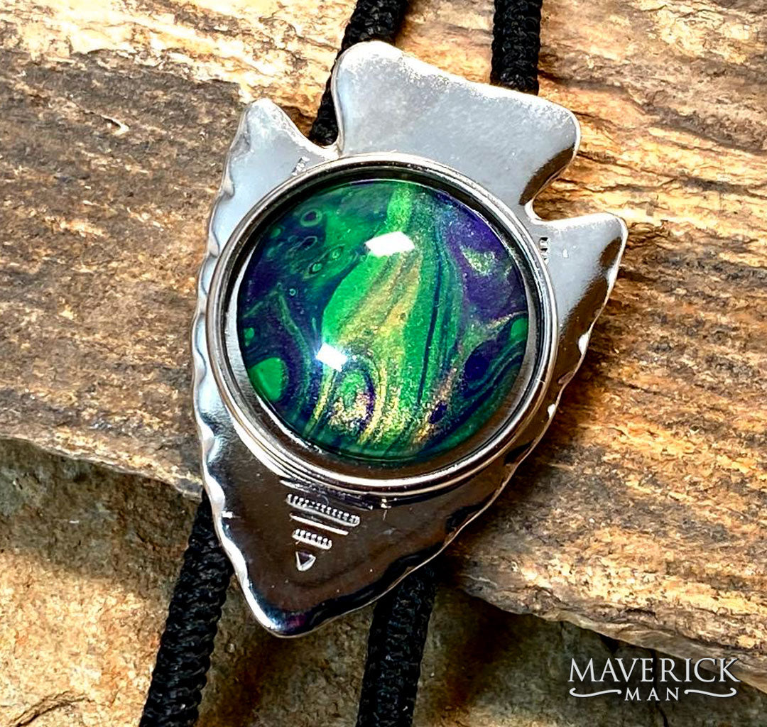 Shiny silver arrowhead bolo with hand painted stone from the Party Gras collection