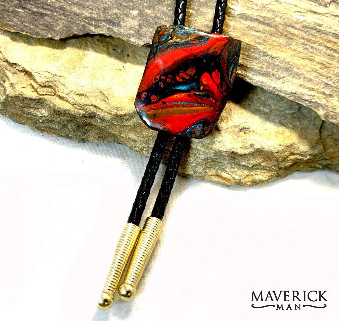 Hand painted bolo tie made from slate in Southwestern colors