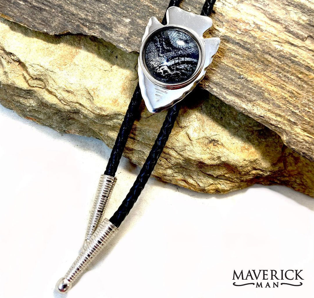 Silver arrowhead bolo with black and platinum hand painted stone