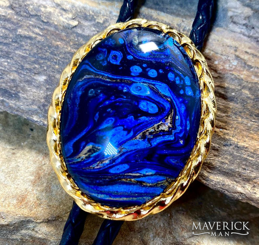 Large golden twist bolo with stunning sapphire blue hand painted stone