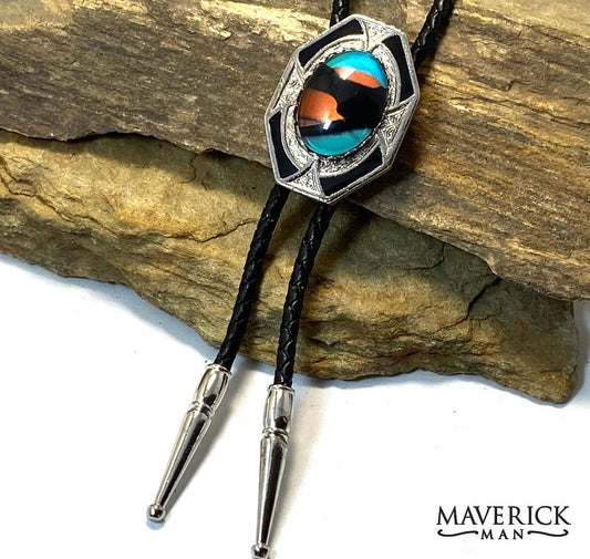 Unusual turquoise, copper and black hand painted stone in silver bolo