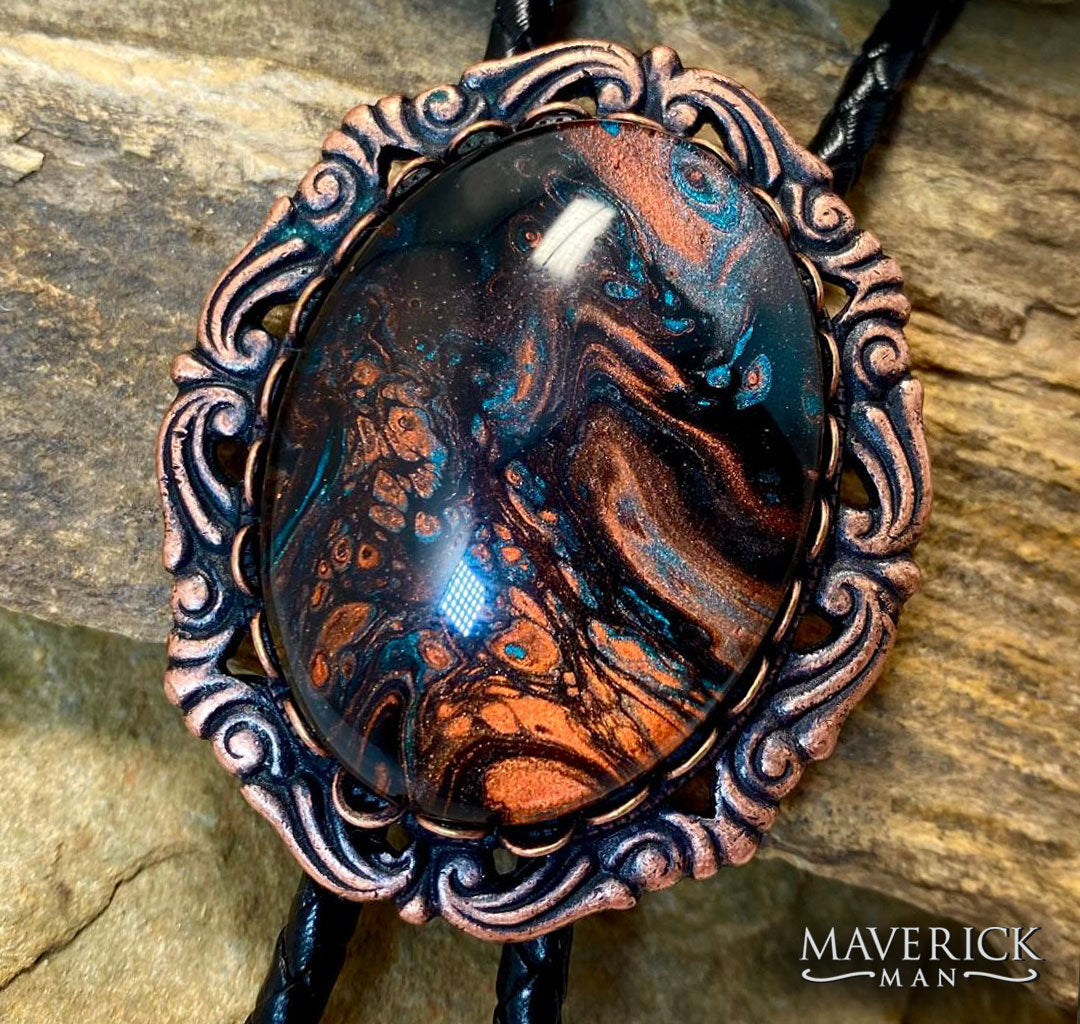Ornate copper bolo with hand painted turquoise and copper stone