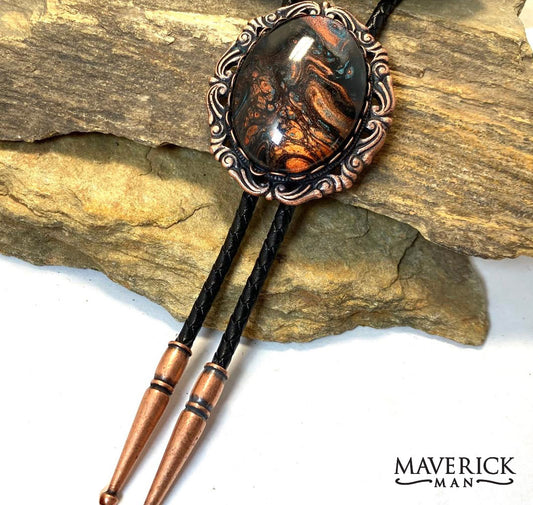 Ornate copper bolo with hand painted turquoise and copper stone