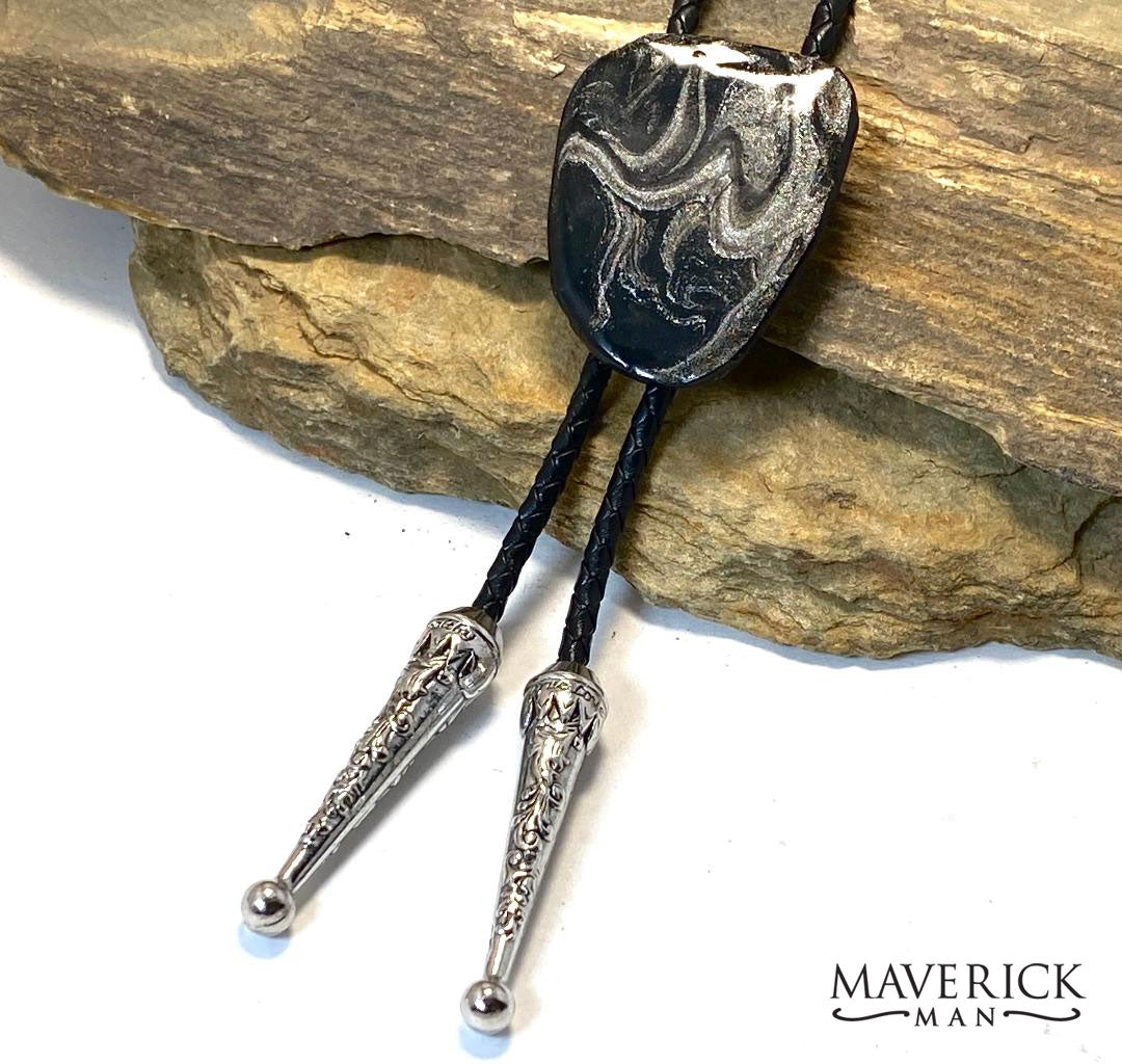 Swirls of black and platinum on our hand painted slate bolo