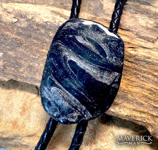 Eye-catching hand painted slate bolo with our top-selling black and platinum palette