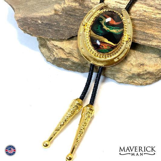 Golden Horseshoe bolo tie with hand painted stone in green earthtones