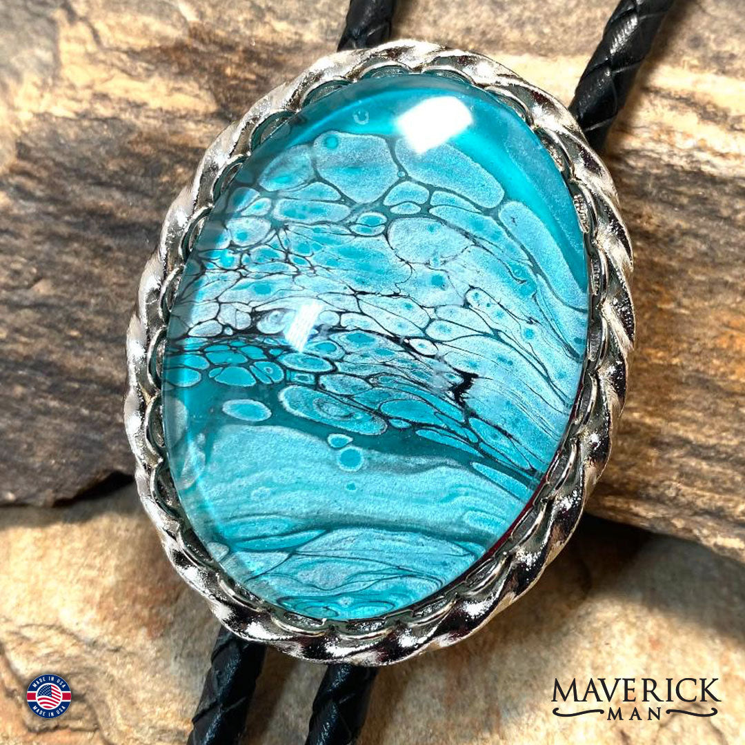 Turquoise and black hand painted stone in large silver twist bolo