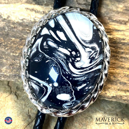 Black and white hand painted stone in silver twist bolo tie