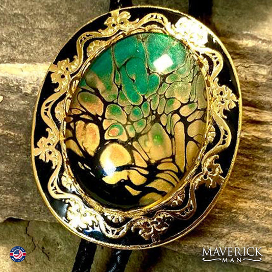Gold and black filigree bolo tie with hand painted stone