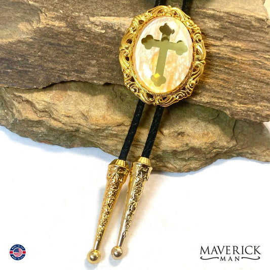 Golden filigree bolo with embedded gold foil cross