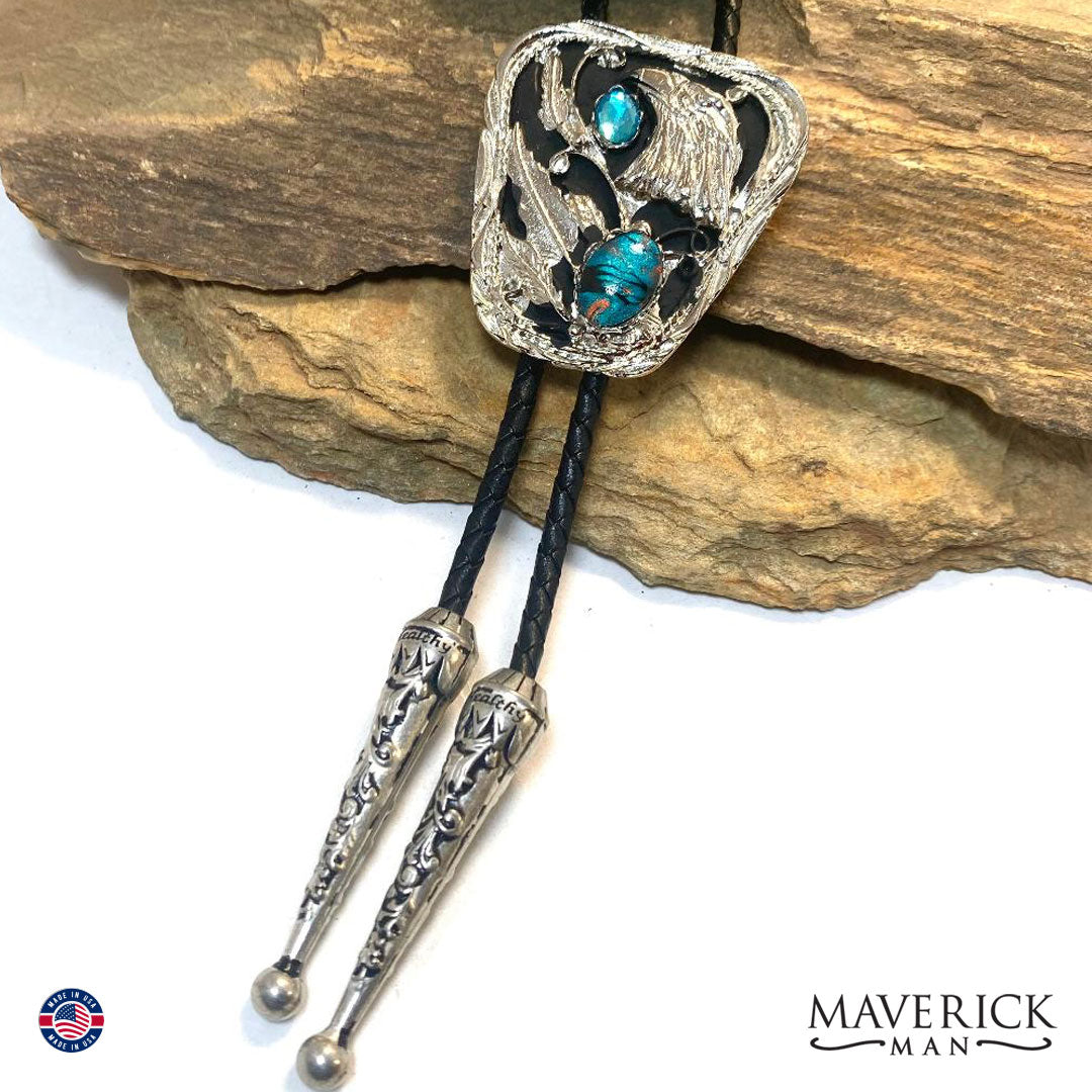 Silver eagle bolo tie with hand painted turquoise and copper stone