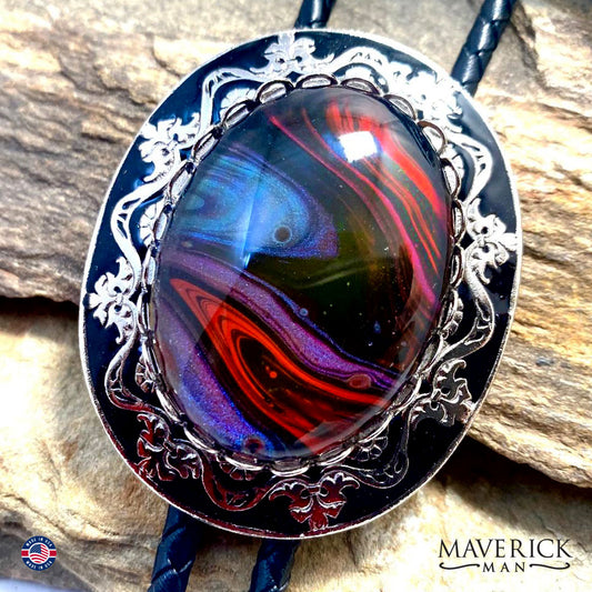Unusual multi-colored hand painted stone in filigree bolo