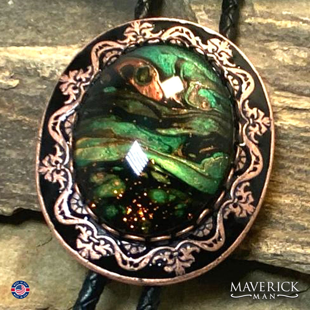 Black and copper filigree bolo tie with hand painted stone