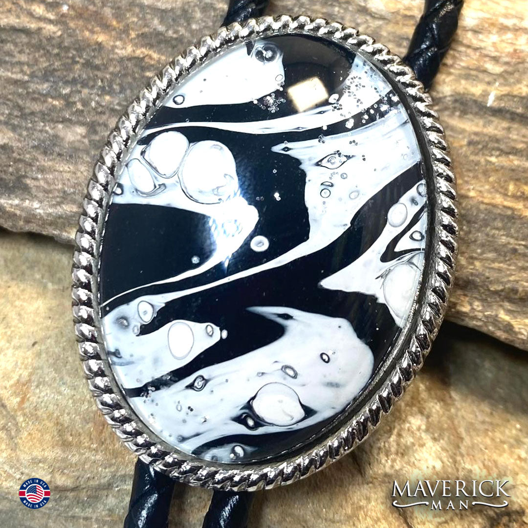 Black and white hand painted stone in silver beaded bolo tie