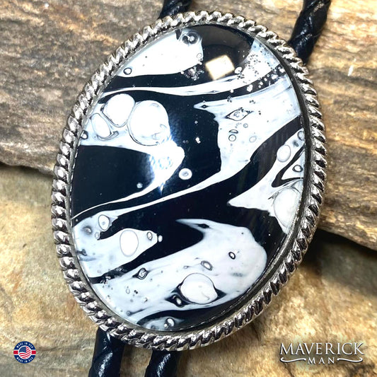 Black and white hand painted stone in silver beaded bolo tie