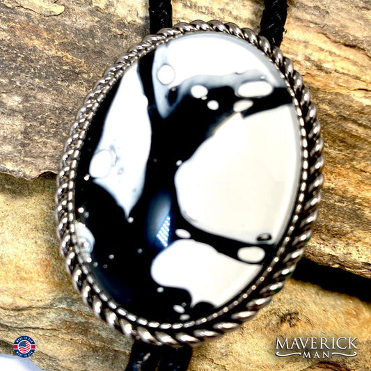 Black and white hand painted stone in braided silver bolo tie