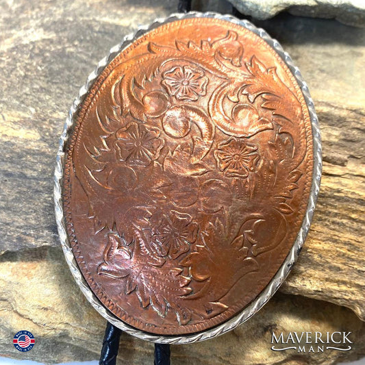 Rich copper leather in belt buckle sized bolo tie