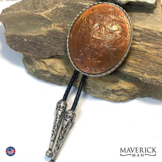 Rich copper leather in belt buckle sized bolo tie