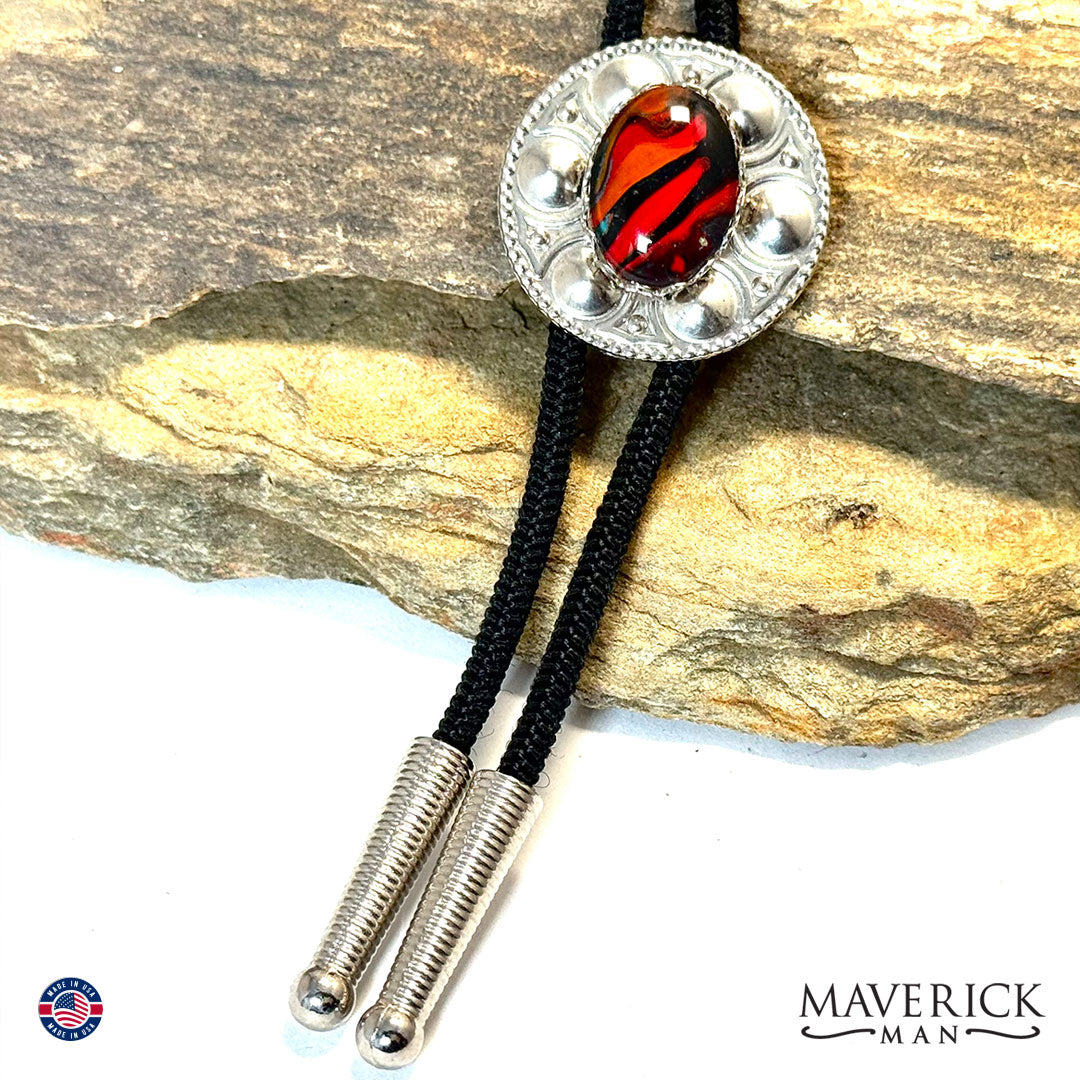 Small bolo tie with red and black hand painted stone