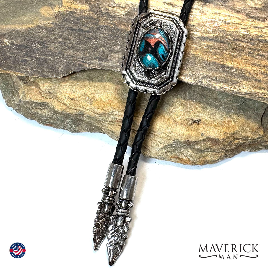 Silver geometric bolo tie with hand painted stone