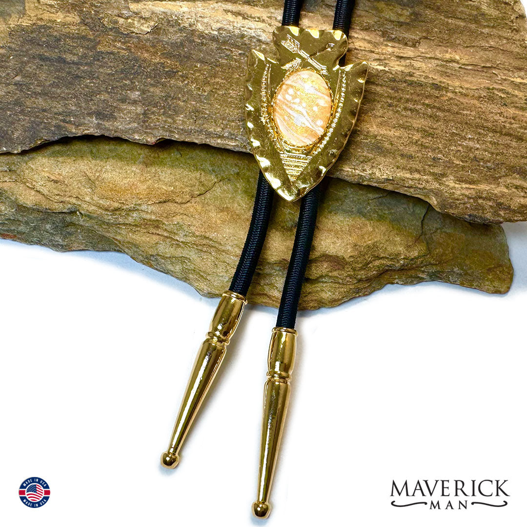 Classic arrowhead bolo tie with hand painted stone