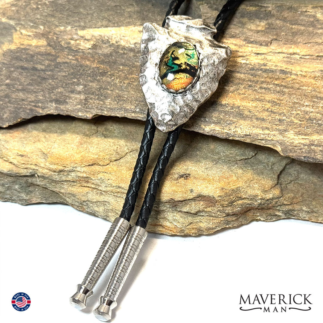 Hammered arrowhead bolo tie with hand painted stone