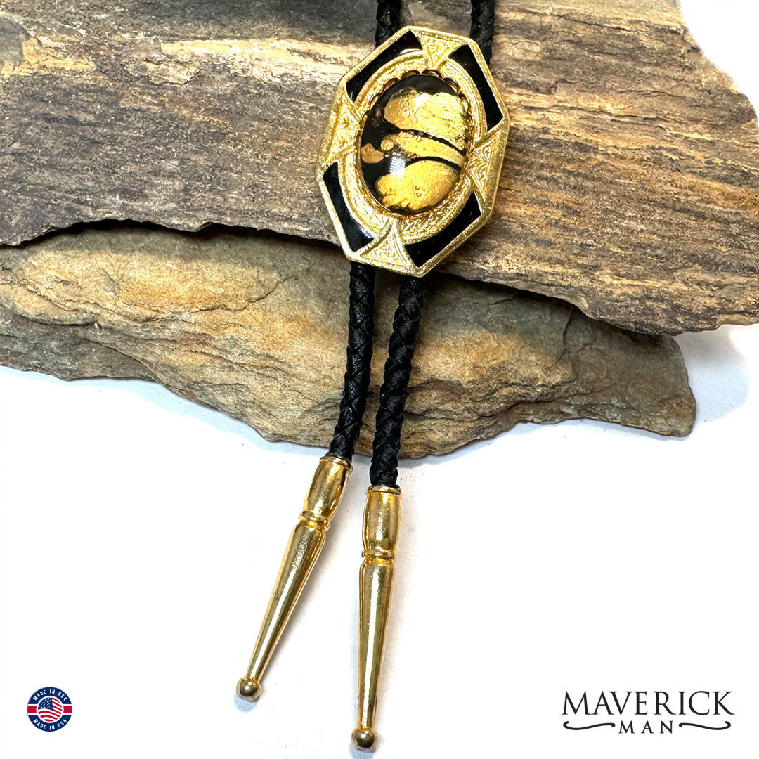 Eye-catching golden bolo tie with hand painted stone