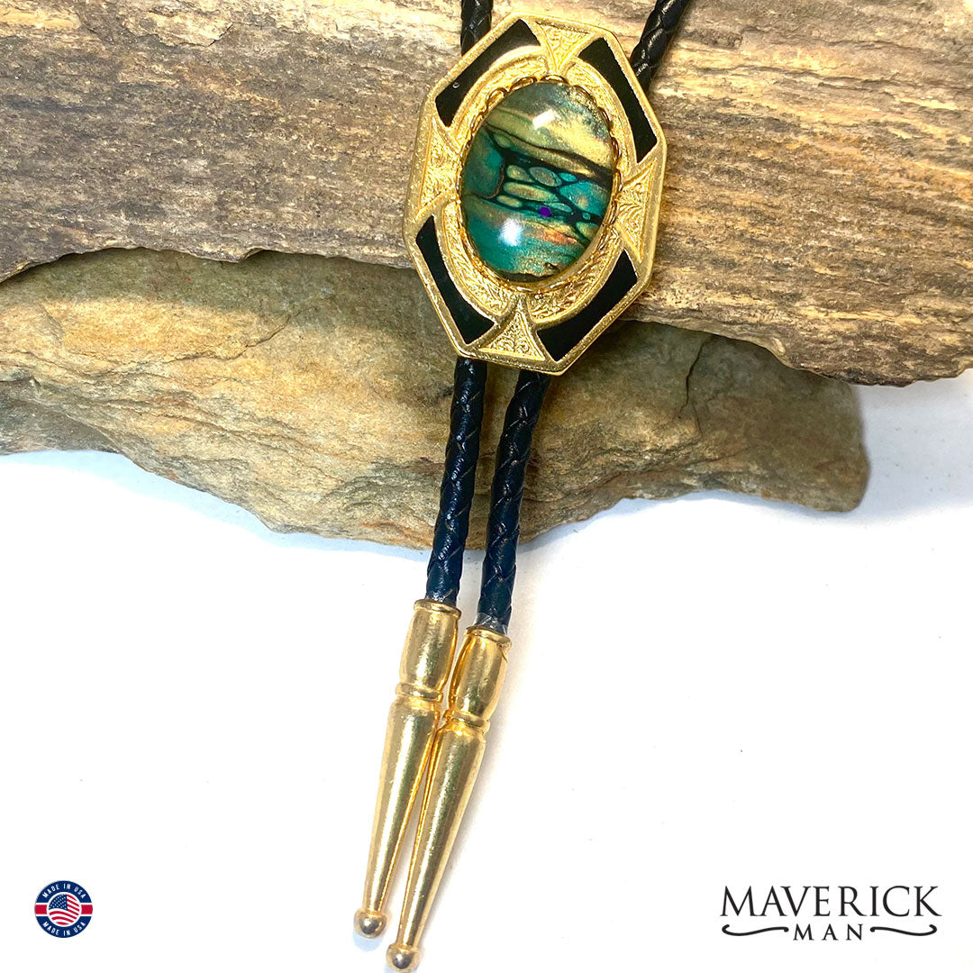 Gold and black bolo tie with hand painted stone in greens