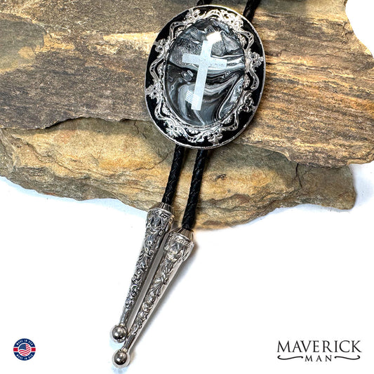 Christian bolo tie with hand painted stone and embedded cross