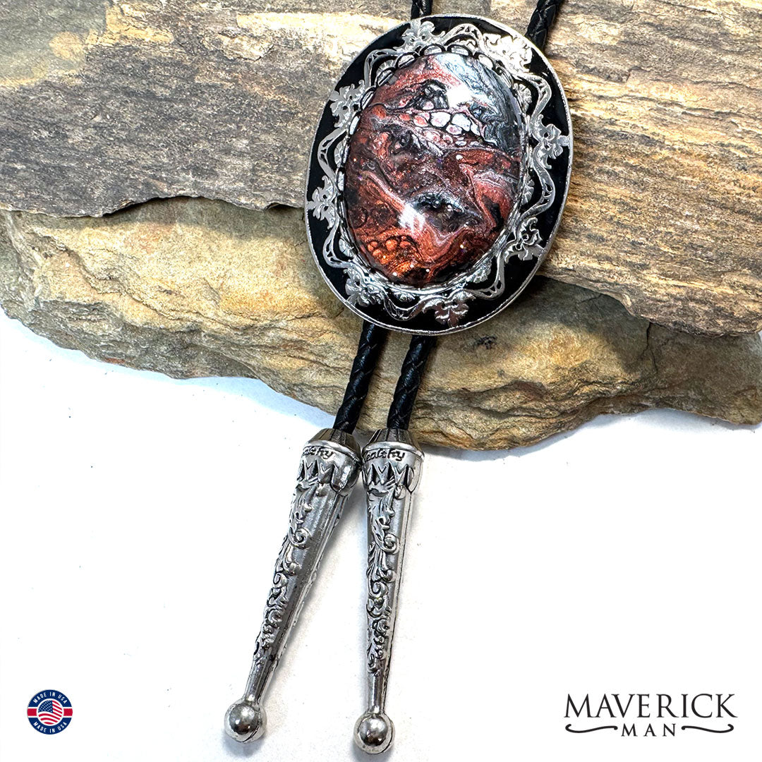 Filigree bolo tie with copper w black and white hand painted stone