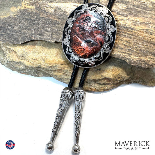 Filigree bolo tie with copper w black and white hand painted stone