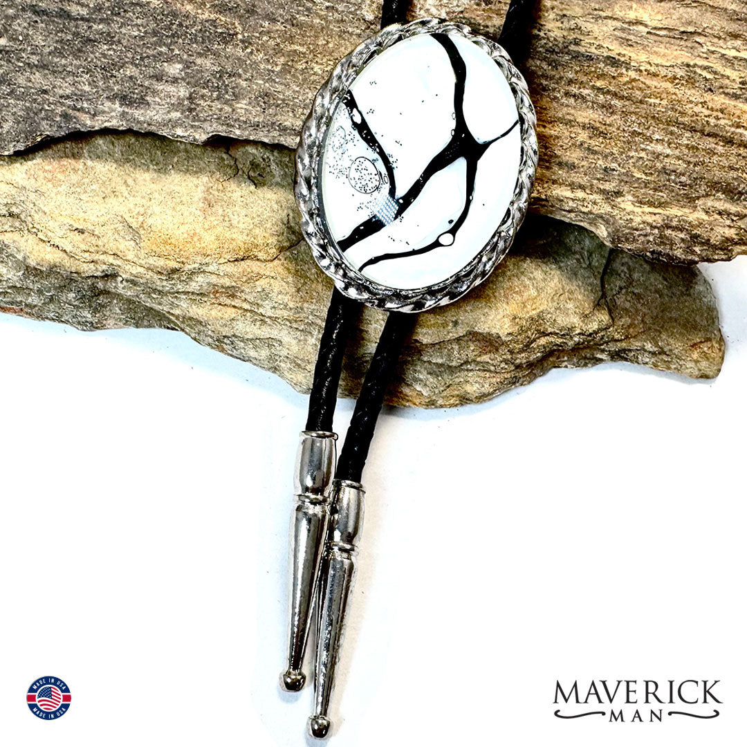 Silver twist bolo tie with hand painted black and white stone