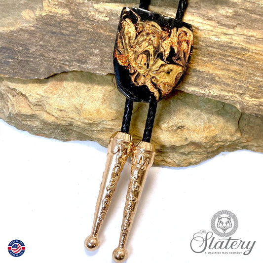 Rich earthtones and black on bolo tie made from slate