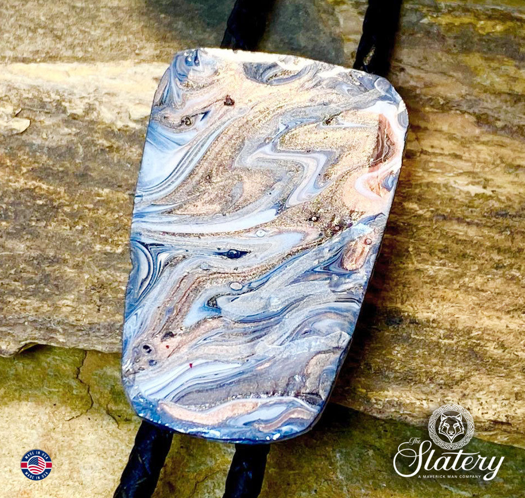 Unusual black and white bolo tie with rose gold accents