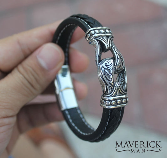 Braided leather bracelet with stainless steel filigree accents