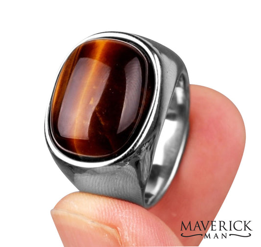 Eye-catching tainless steel ring with tiger eye looking wood stone