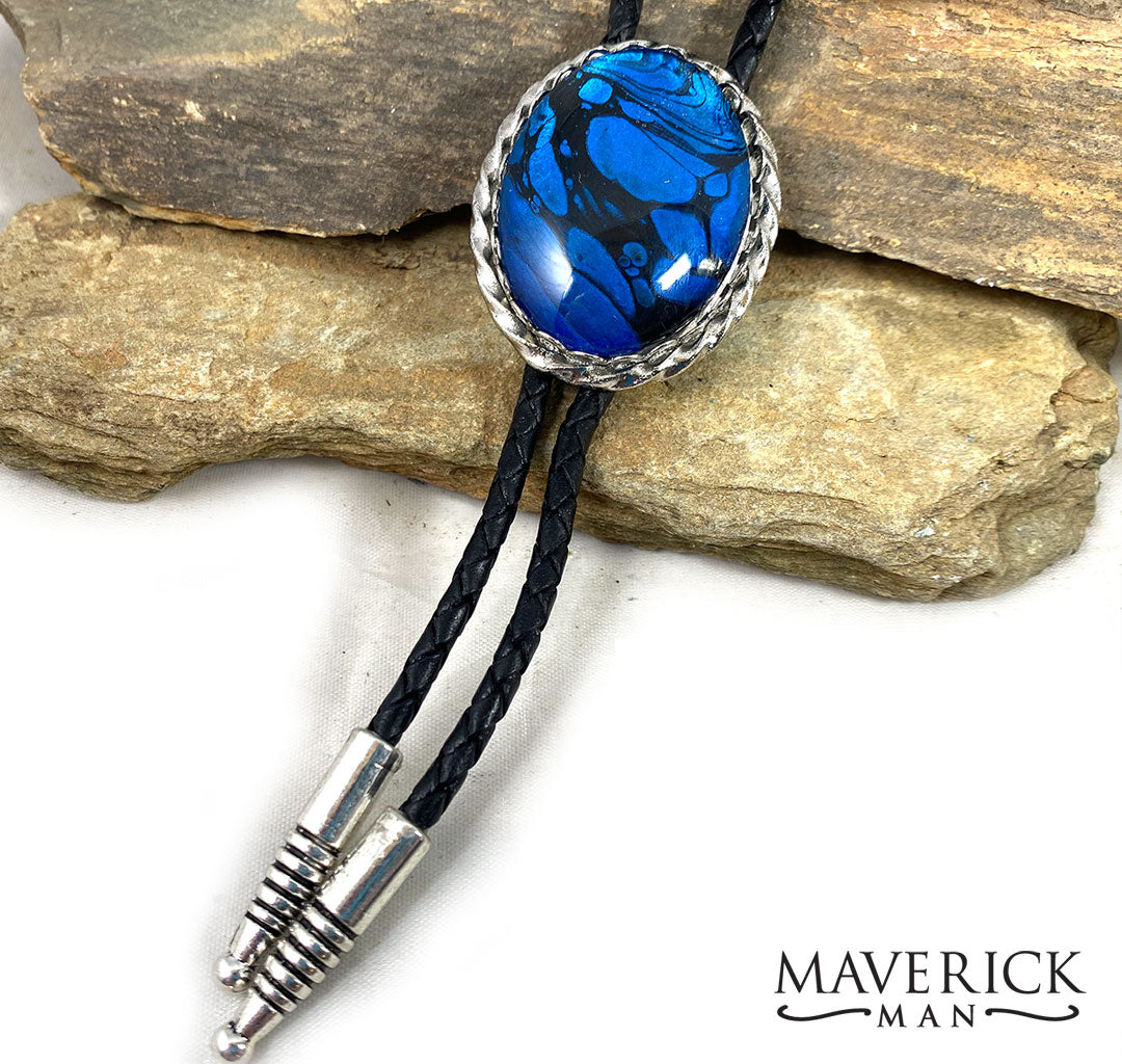 Blue indigo hand painted stone in our large silver bolo