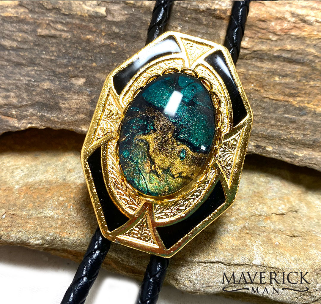 Gold and black dressy geometric bolo with green stone