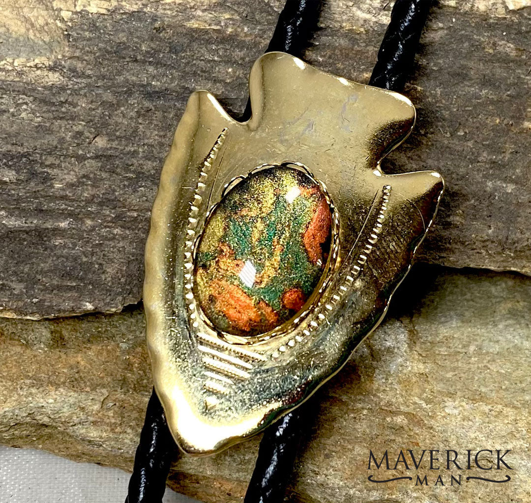Gold arrowhead bolo with green earthtones