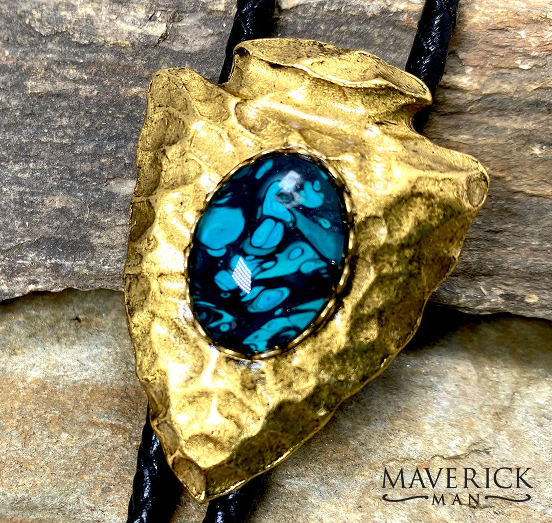 Hammered arrowhead bolo with hand painted turquoise and black stone