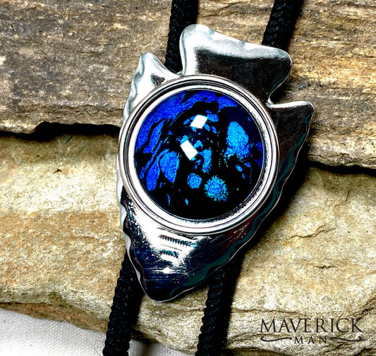 Silver arrowhead bolo with metallic blue and black hand painted stone