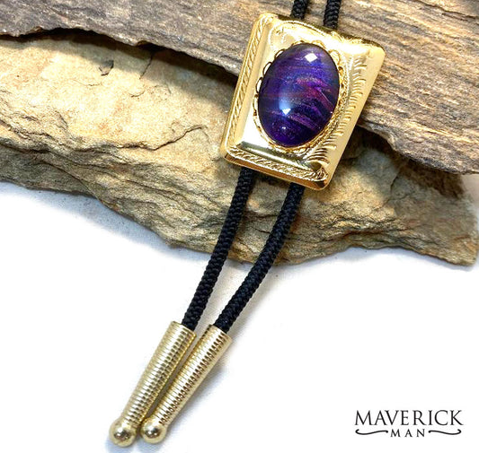 Gold bolo with purple and gold hand painted stone