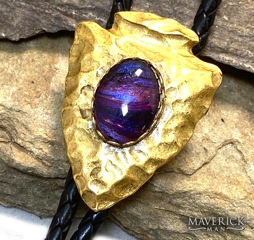 Hammered golden arrowhead bolo with hand painted purple stone